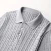 Men’s ribbed polo t-shirt with short sleeves and a slim fit collar.