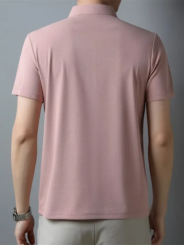 Men’s pink polo t-shirt with short sleeves and classic collar.