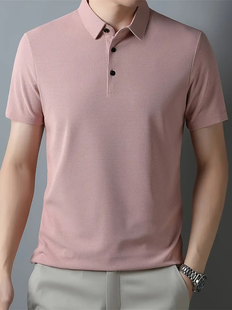 Men’s pink polo t-shirt with short sleeves and classic collar.